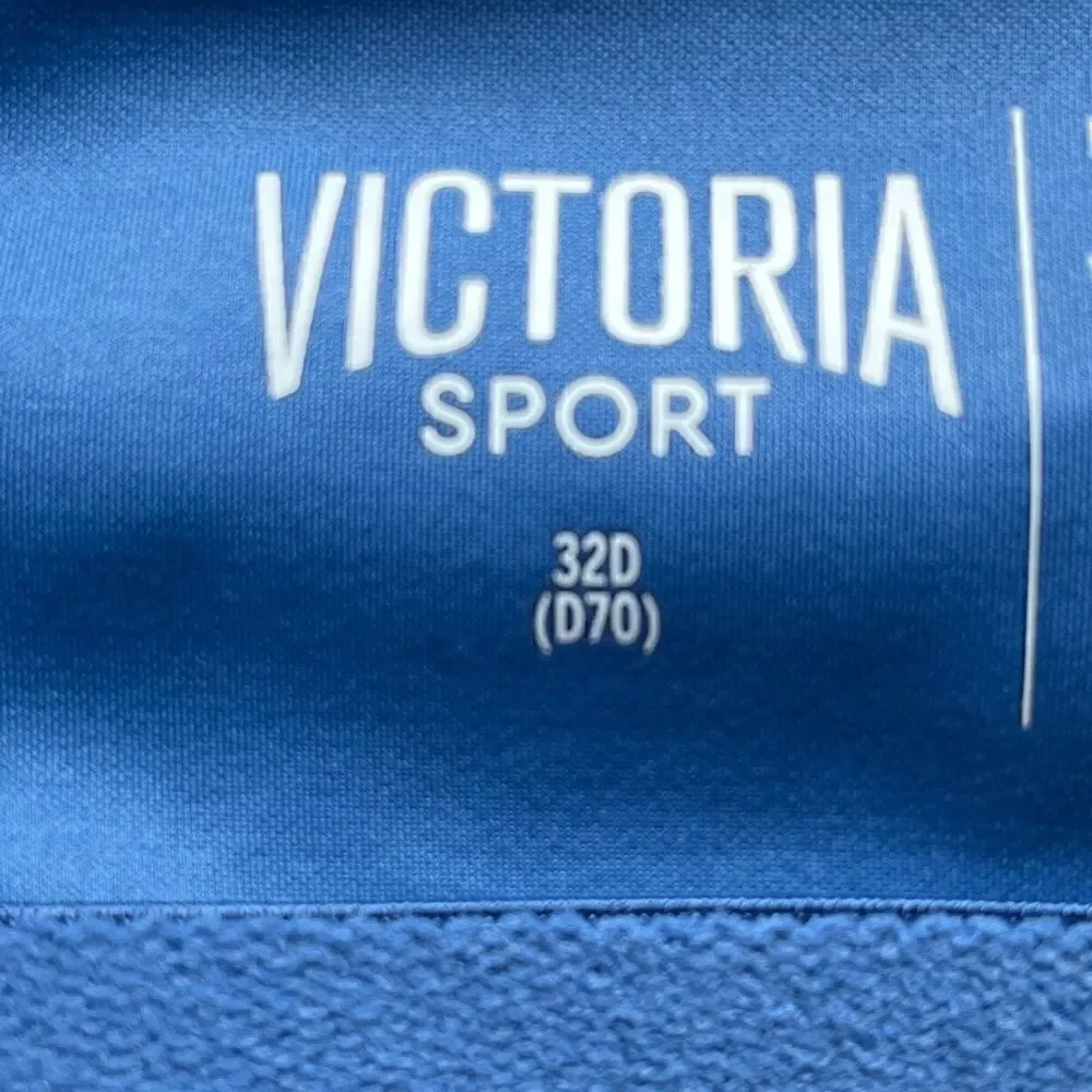 Victoria sport bra blue 32D padded underwire looks new zipper and clasp